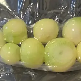 Лук в вакуумной упаковке