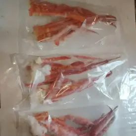Конечности краба стригуна (опилио), варено-морож., лом