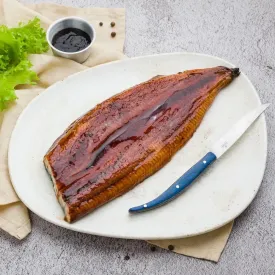 Угорь жареный в соусе, 1 кг.