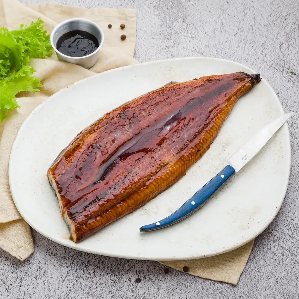 Угорь жареный в соусе, 1 кг. фото 1