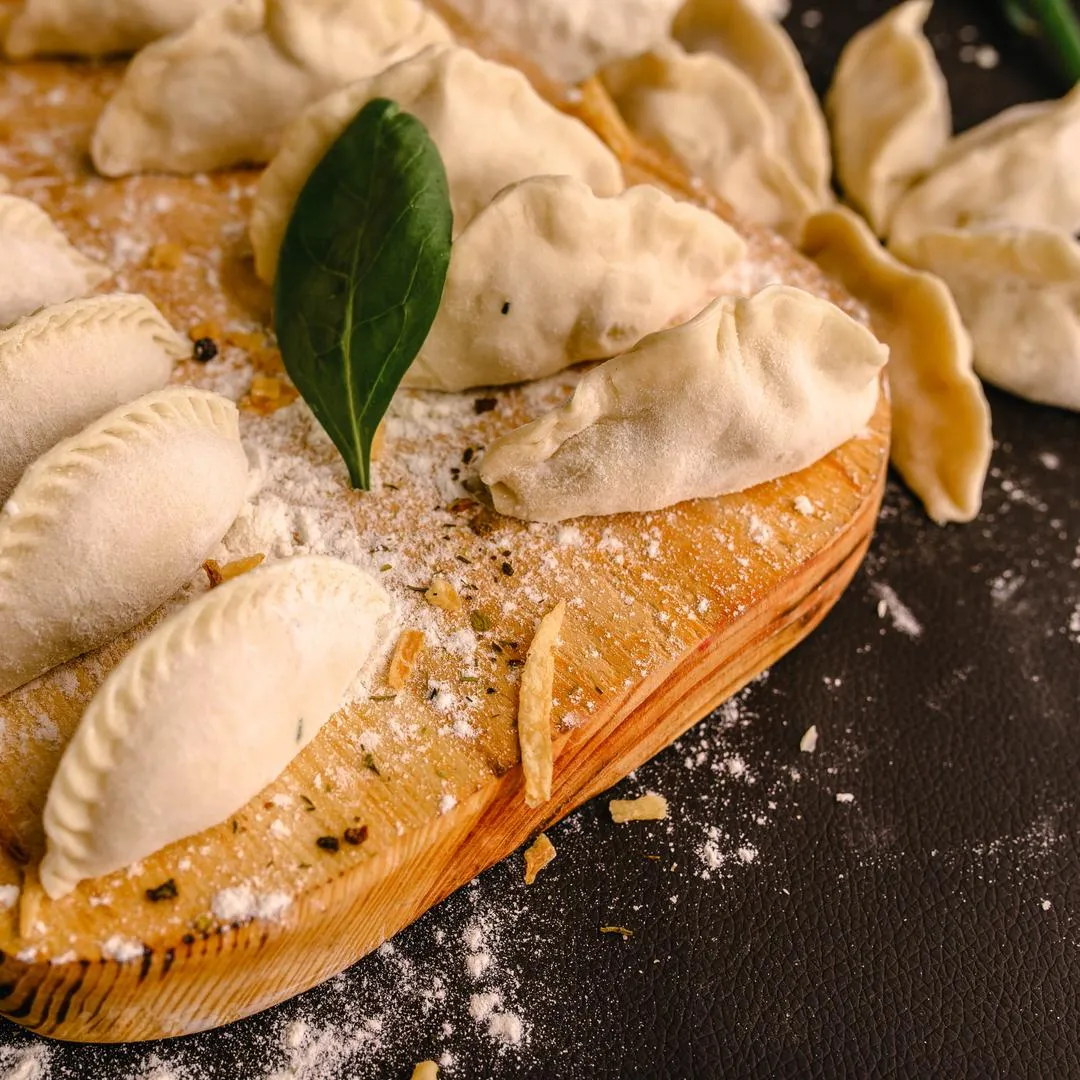 Вареники с капустой ручной лепки