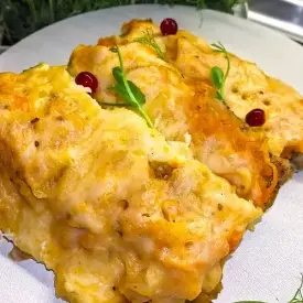 Хек с овощами под сырной шапочкой